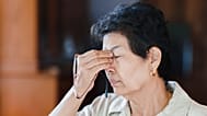 A woman suffers from vision problems.
