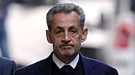 Former French President Nicolas Sarkozy leaves his home Tuesday, Oct. 21, 2025 in Paris 