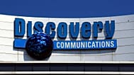 FILE - The Discovery Communications logo atop its headquarters in Silver Spring, Maryland. 2017.
