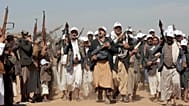   مقاتلون من الحوثيين خلال مسيرة قرب صنعاء دعمًا للفلسطينيين واحتجاجًا على الضربات الأمريكية في اليمن، 22 يناير 2024.