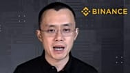FILE - Binance CEO Changpeng Zhao answers a question during a Zoom meeting interview with The Associated Press on Nov. 16, 2021.