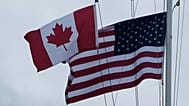 Flags of Canada and the United States are shown in San Francisco, Friday 10 October 2025.