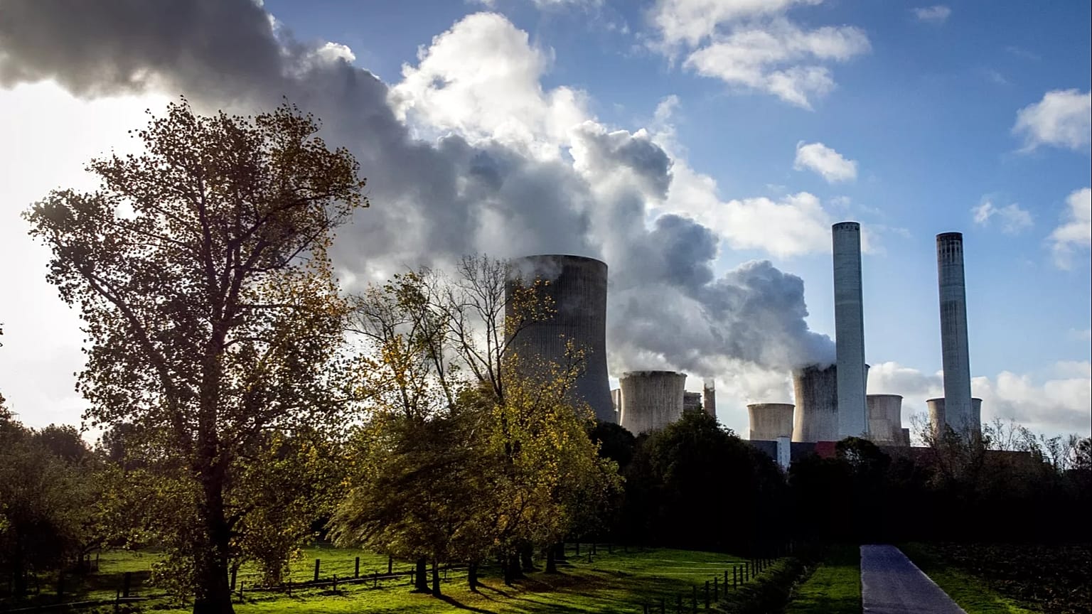 Steam rises from the coal-fired power plant in Niederaussem, 2 November, 2022