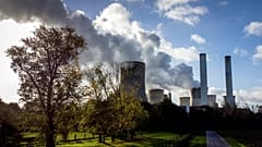 Steam rises from the coal-fired power plant in Niederaussem, 2 November, 2022