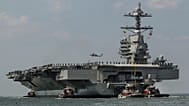 The aircraft carrier USS Gerald R. Ford heads to a naval station in Norfolk, 14 April, 2017 