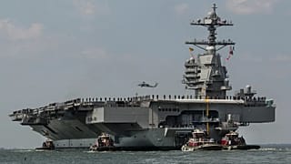 The aircraft carrier USS Gerald R. Ford heads to a naval station in Norfolk, 14 April, 2017 