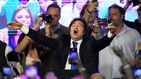 Argentina's President Javier Milei celebrates after winning in legislative midterm elections in Buenos Aires, Argentina, Sunday, Oct. 26, 2025. (AP Photo/Rodrigo Abd)