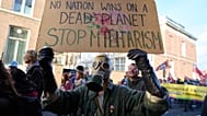 Thousands of people demonstrate calling for tougher action against climate change just days before the Oct. 29