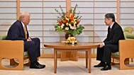 President Donald Trump, left, and Japan's Emperor Naruhito talk during their meeting at the Imperial Palace in Tokyo, Oct. 27, 2025