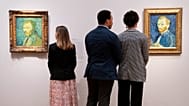 Observers look at pieces by Vincent Van Gogh at The Courtauld Gallery in London on Feb. 1, 2022.