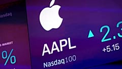 File - The symbol for Apple appears on a screen at the Nasdaq MarketSite, in New York. 1 October 2019. 