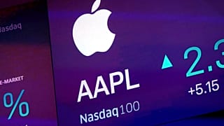 File - The symbol for Apple appears on a screen at the Nasdaq MarketSite, in New York. 1 October 2019. 
