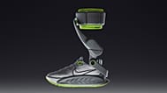 Nike says their Project Amplify shoe has a motor, drive belt and rechargeable battery to help runners go further and faster.