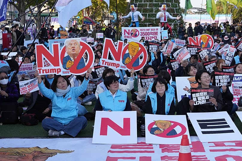 Protesters shout slogans during a rally to denounce the visit by US President Donald Trump in Gyeongju, 29 October, 2025