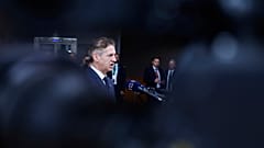 Slovenia's Prime Minister Robert Golob speaks with the media as he arrives for an EU summit at the European Council building in Brussels, 26 June 2025