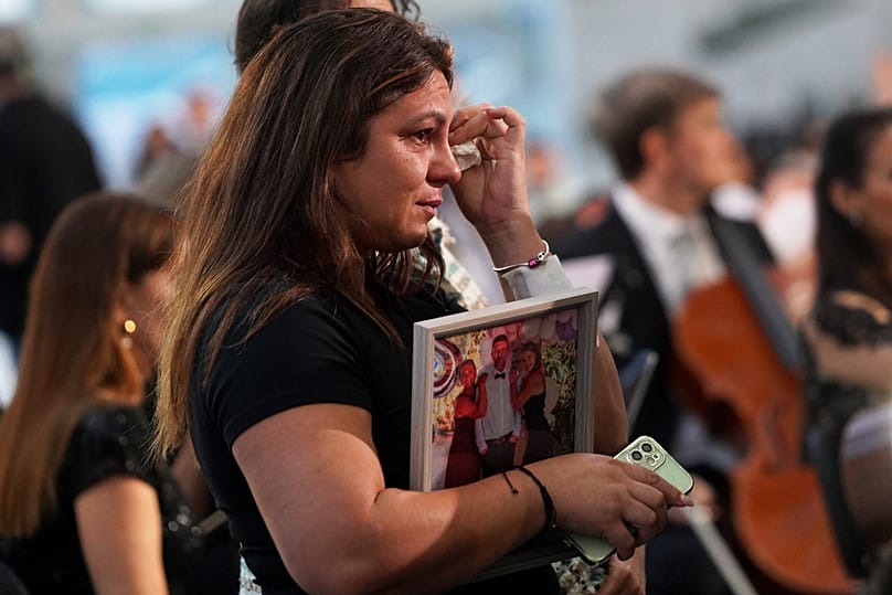 Public figures and relatives of the victims attend a memorial ceremony marking one year since floods that killed more than 230 people in Valencia, 29 October, 2025