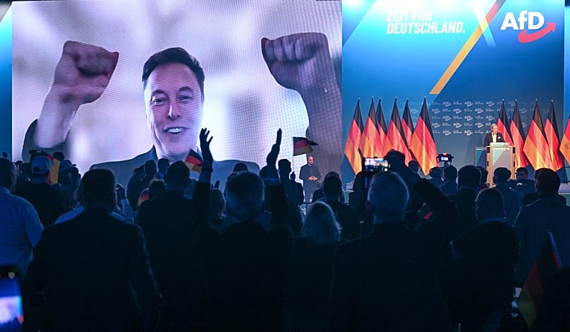 U.S. businessman Elon Musk is shown during a live video link during the AfD's election campaign kick-off, in Halle, Germany, Saturday, Jan. 25, 2025.