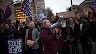 Women shout slogans during a protest marking the International Women's Day in Brussels, Belgium.