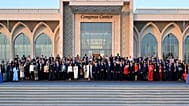Heads of state, ministers, and UNESCO representatives pose for a family photo outside the Samarkand Congress Center, the host venue for UNESCO’s 43rd General Conference