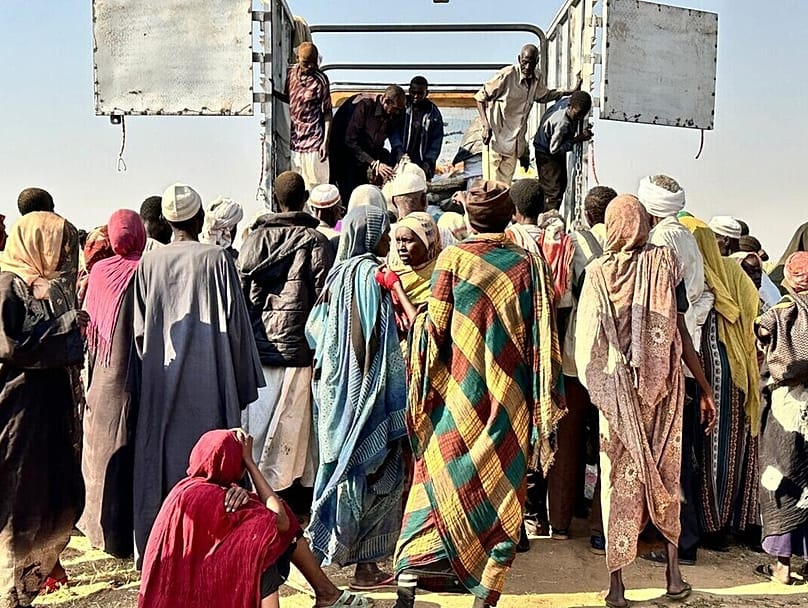 This photo released by The Norwegian Refugee Council shows displaced families from el-Fasher at a displacement camp, Oct. 31, 2025