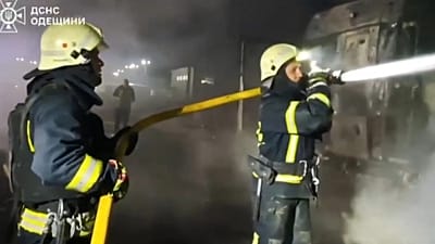 Firefighters hosing down flames at impact site in Odesa, Ukraine, 02 Nov. 2025.