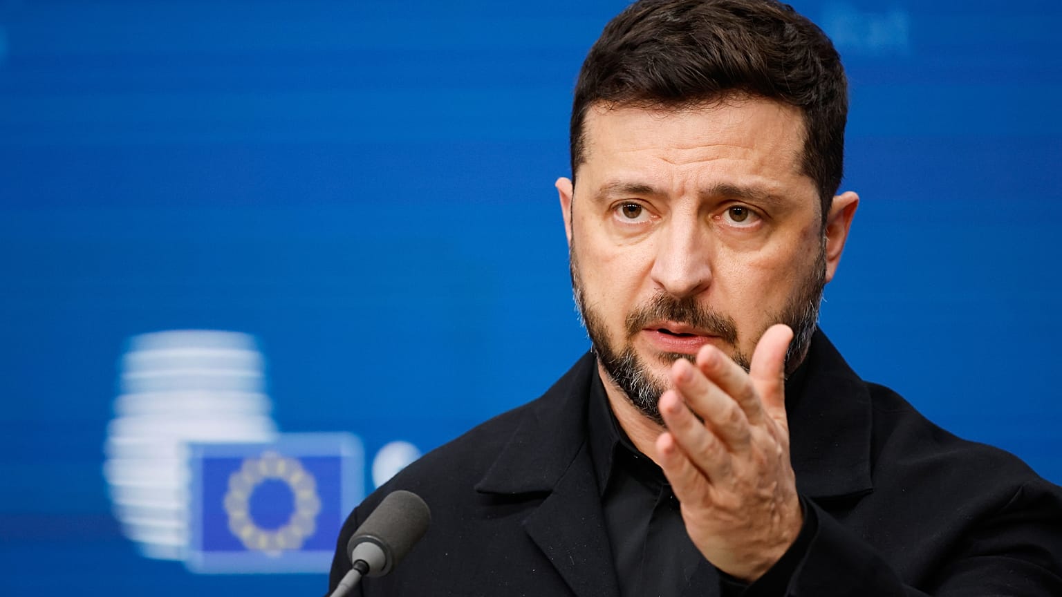 FILE: Ukraine's President Volodymyr Zelenskyy speaks during a media conference at an EU Summit in Brussels, 23 October 2025