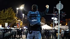An demonstator shout slogans during protest in front of the parliament building in Belgrade, 2 November 2025