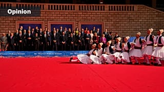 FILE: European Union and Western Balkan leaders watch a traditional dance performance after a group photo at an EU-Western Balkans Summit, in Tirana, 6 December 2022