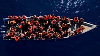 Migrants from Eritrea, Libya and Sudan sail a wooden boat in the Mediterranean Sea north of Libya, 17 June, 2023
