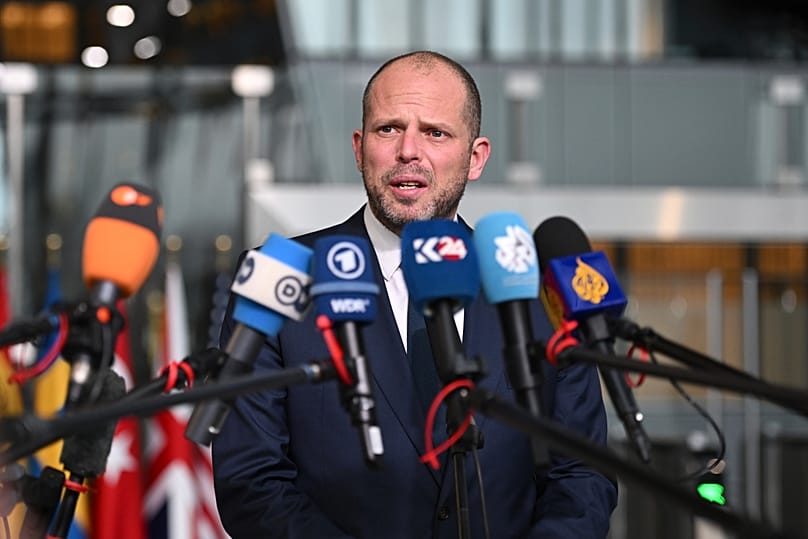 Belgium's Defence Minister Theo Francken speaks with the media as he arrives for a meeting of NATO defence ministers in Brussels, 13 February, 2025