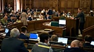 Latvian lawmakers attend a Saeima session in Riga, 11 August, 2022