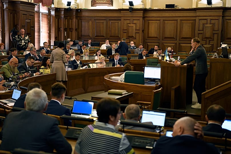 Latvian lawmakers attend a session in Riga, 11 August, 2022