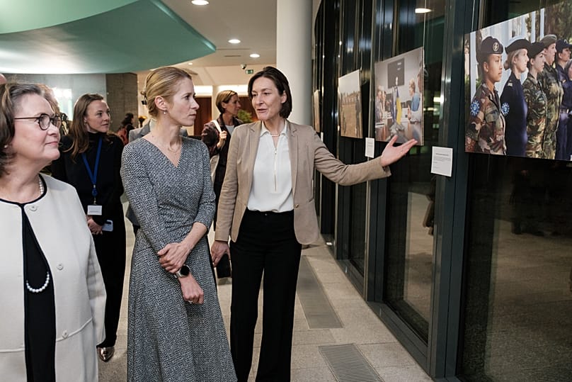 Deputy Executive Director of UN Women Kirsi Madi, EU High Representative Kaja Kallas and EU Ambassador for Equality Aude Maio-Coliche walk through the exhibition in Brussels.