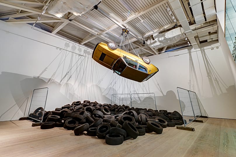Allan Kaprow’s 'YARD' paired with Conrad Shawcross’s suspended Golden Lotus (Inverted)