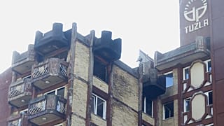 A view of burned balcony and windows at a retirement home following a major fire that killed at least 11 people, in Tuzla, Bosnia