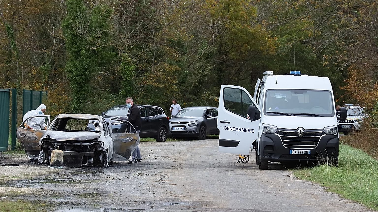 Investigators inspect the burned car after a motorist deliberately rammed pedestrians and cyclists across two neighbouring towns on Île d’Oléron, 5 November, 2025 