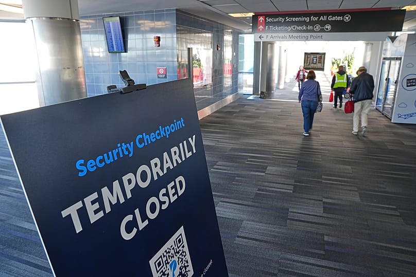 A sign is posted near a TSA screening area at Philadelphia International Airport in Philadelphia, Wednesday, Nov. 5, 2025. (AP Photo/Matt Rourke)