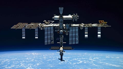 In this handout photo released by Roscosmos Space Agency Press Service, a view of the International Space Station taken on March 30, 2022. 