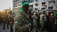Fighters from the Qassam Brigades, the military wing of Hamas, in Gaza City, 19 January, 2025