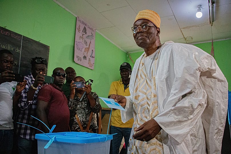 Presidential opposition candidate Issa Tchiroma casts his ballot at a polling station in Garoua, Cameroon, Sunday, Oct. 12, 2025