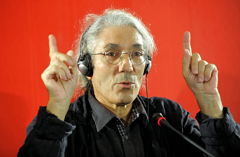 الكاتب الجزائري بوعلام صنصال، خلال مؤتمر صحفي في فرانكفورت، وسط ألمانيا، الجمعة 14 أكتوبر/تشرين الأول 2011. 