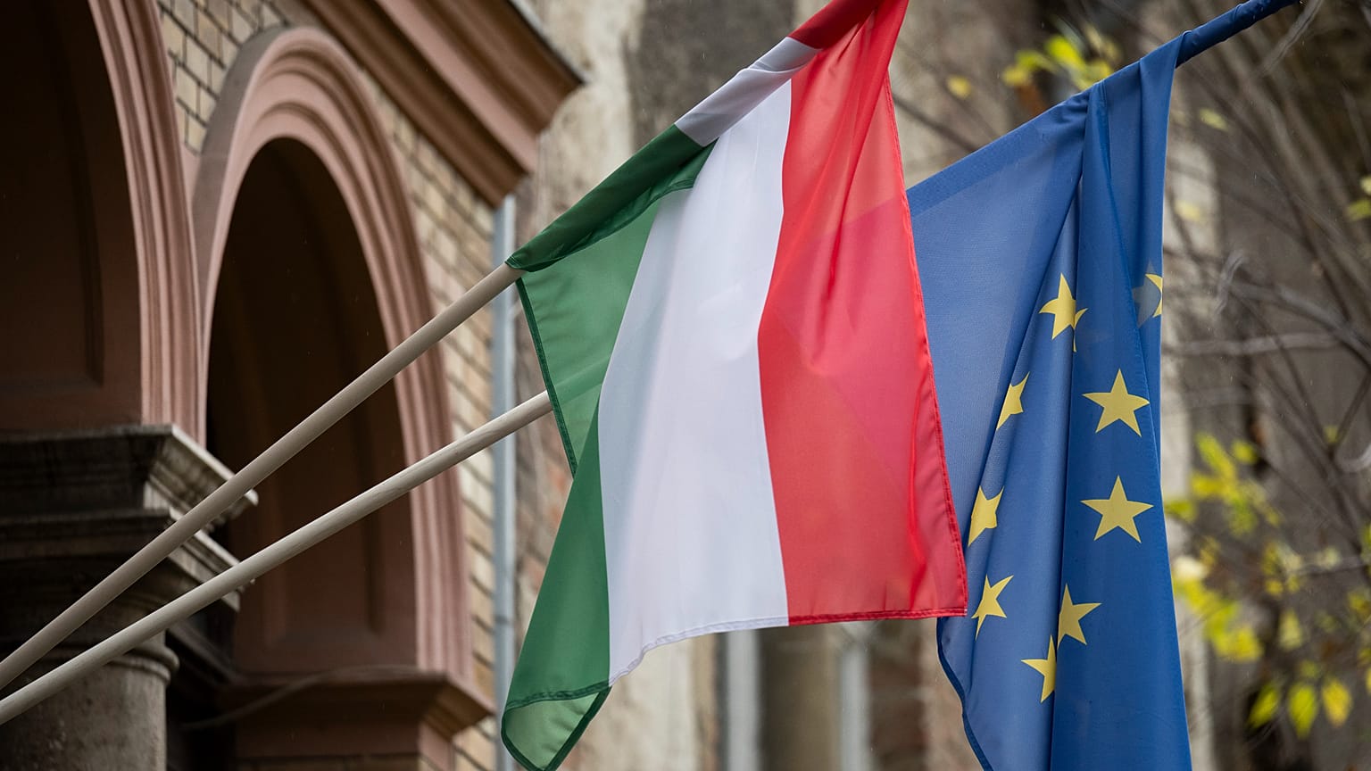 FILE: A Hungarian and a European Union flag is seen on a building in downtown Budapest, 20 November 2023