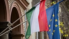 FILE: A Hungarian and a European Union flag is seen on a building in downtown Budapest, 20 November 2023