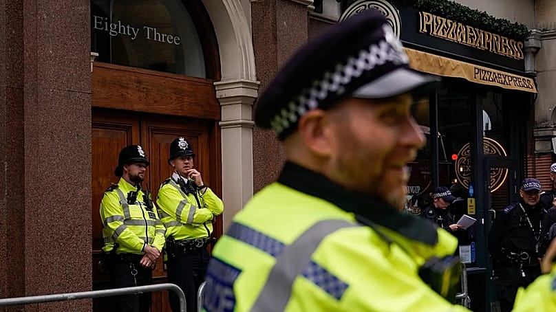 Police officers patrol in London, 10 August, 2024