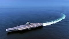 FILE: In this photo released by Xinhua News Agency, China's third conventionally powered aircraft carrier, the Fujian, conducts a maiden sea trial 7 May 2024