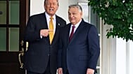 President Donald Trump, left, greets Hungary's Prime Minister Viktor Orban at the White House, Friday, Nov. 7, 2025, in Washington. (AP Photo/John McDonnell)