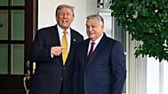 President Donald Trump, left, greets Hungary's Prime Minister Viktor Orban at the White House, Friday, Nov. 7, 2025, in Washington. (AP Photo/John McDonnell)