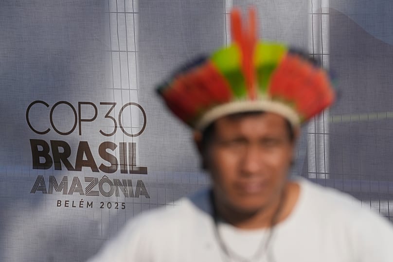 An Indigenous man takes part in a demonstration in defense of the Amazon during the COP30 U.N. Climate Summit, in Belem, Para state, Brazil, Thursday, Nov. 6, 2025.