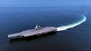 In this photo released by Xinhua News Agency, China's third conventionally powered aircraft carrier, the Fujian
