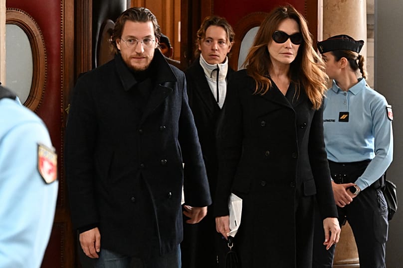 Carla Bruni-Sarkozy and Jean Sarkozy leave a Paris court before it decides whether to release Nicolas Sarkozy from prison, 10 November, 2025 